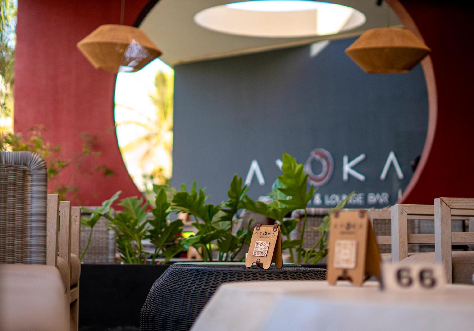 Noom Hotel Dakar Sea Plaza, A Member Of Radisson Individuals Exterior foto A restaurant in the resort