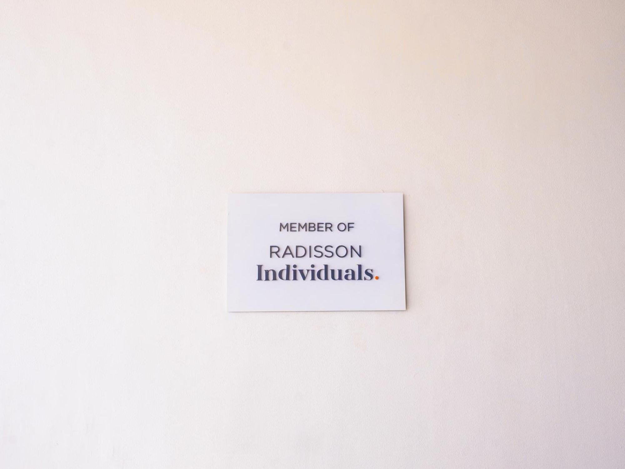 Noom Hotel Dakar Sea Plaza, A Member Of Radisson Individuals Exterior foto A member of Radisson Individuals sticker