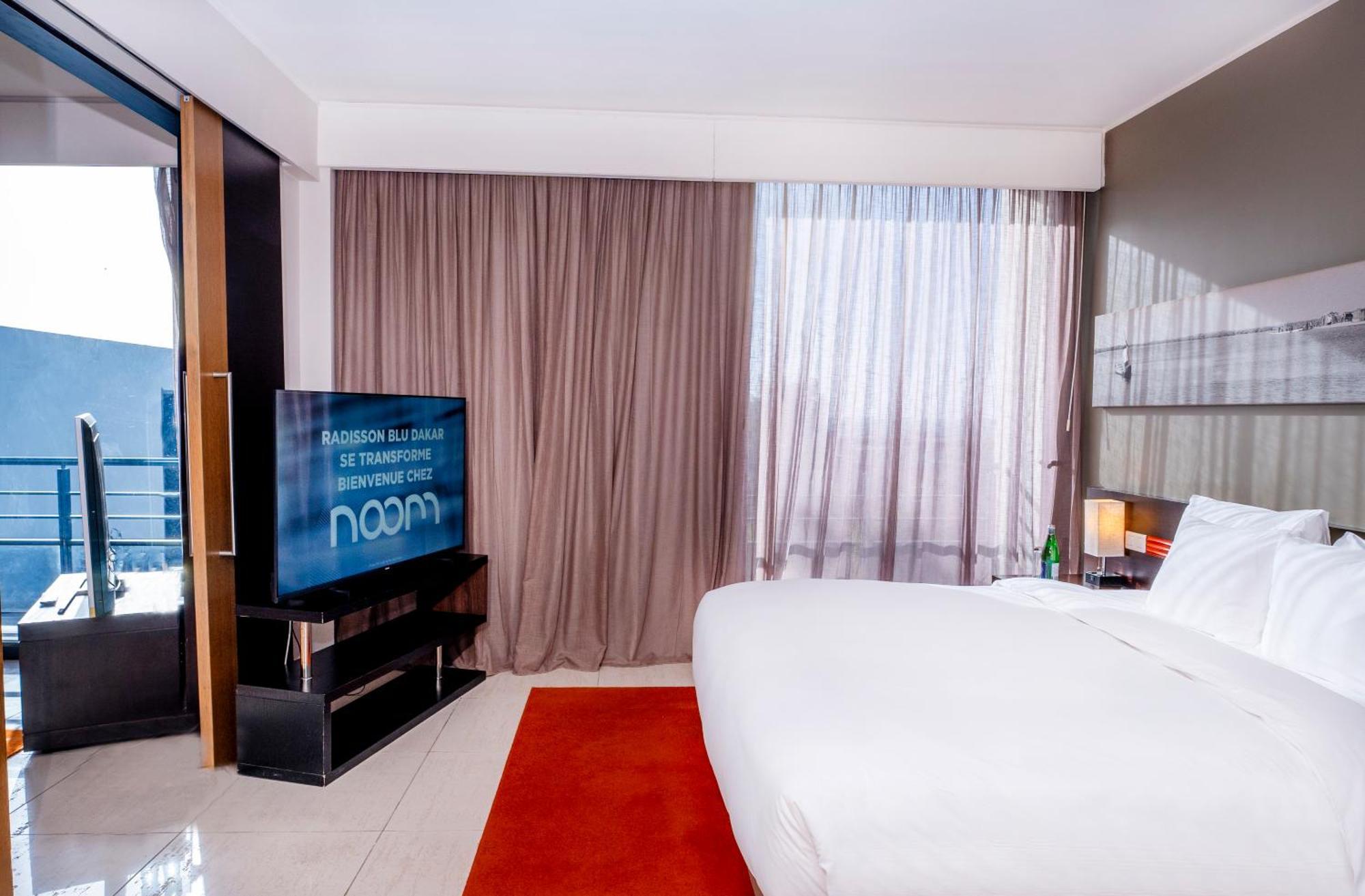 Noom Hotel Dakar Sea Plaza, A Member Of Radisson Individuals Exterior foto A bedroom at the hotel