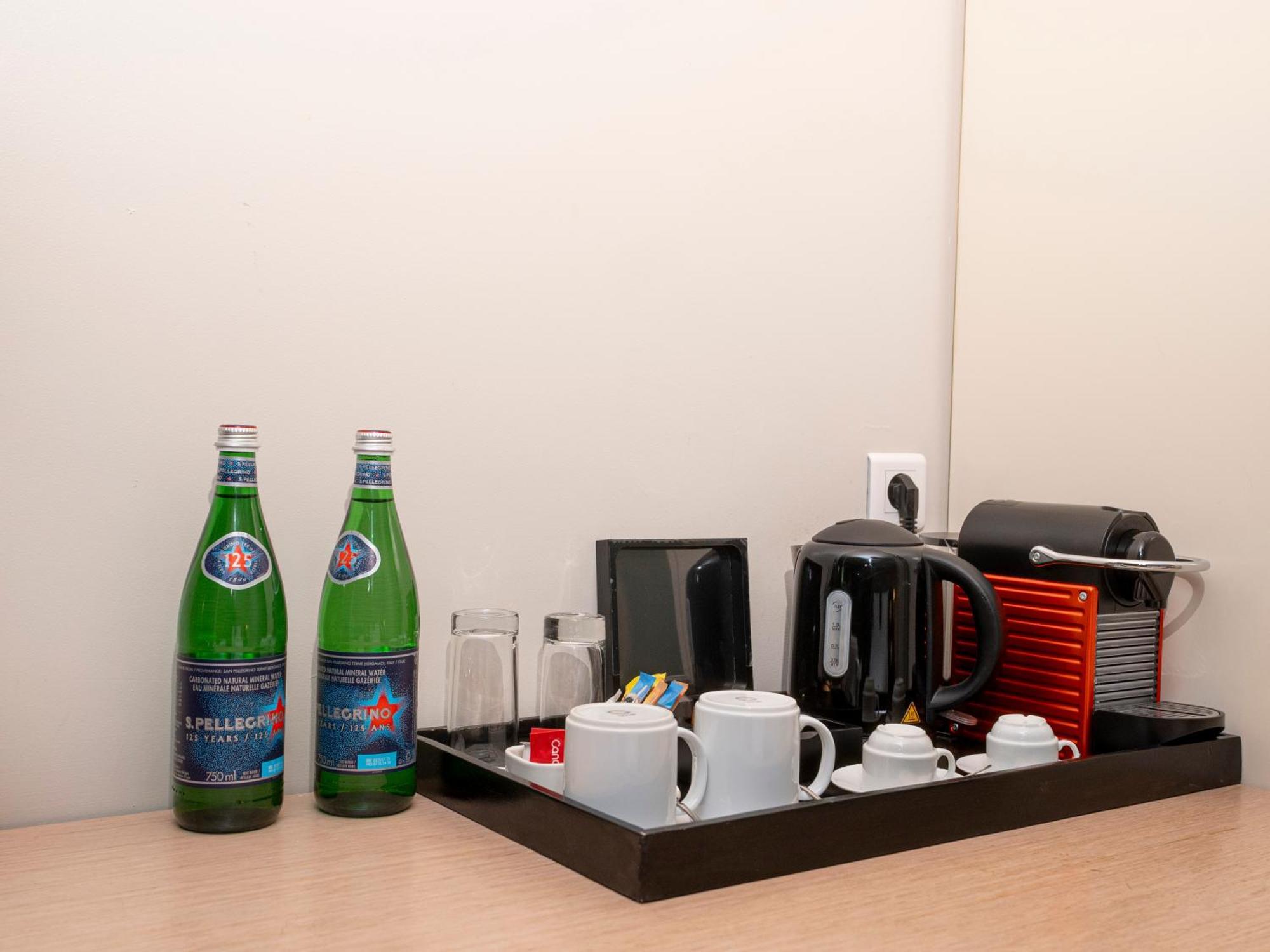 Noom Hotel Dakar Sea Plaza, A Member Of Radisson Individuals Exterior foto A Nespresso machine in a hotel room
